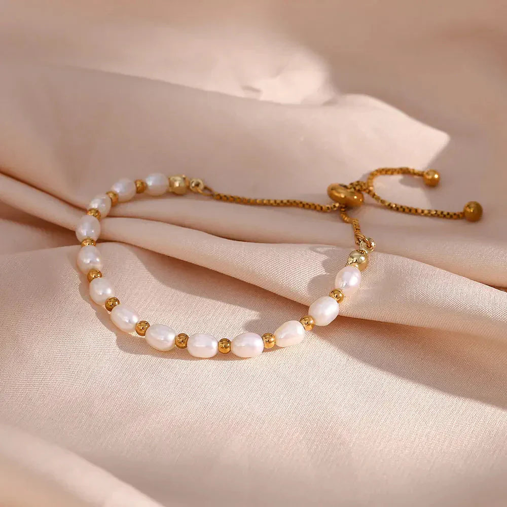 Elegante Parel e Bracciale in Oro