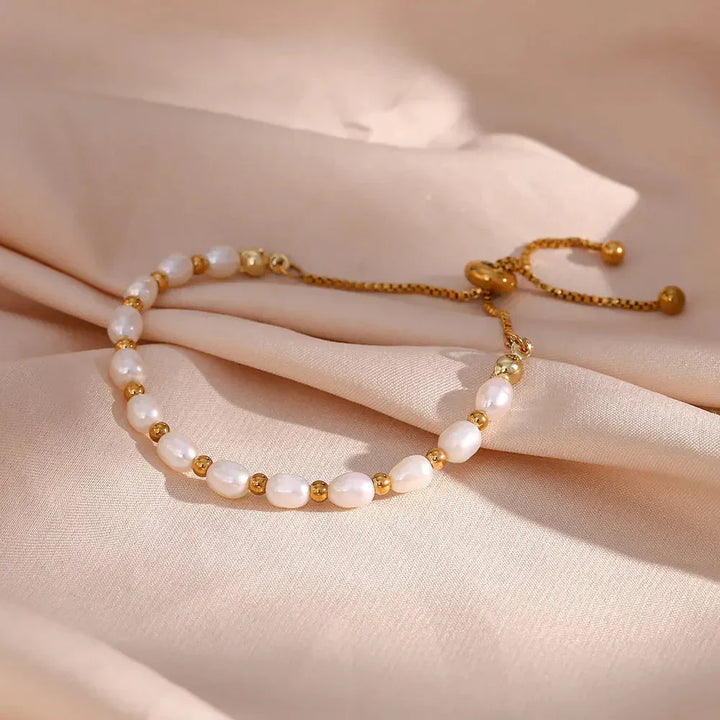 Elegante Parel e Bracciale in Oro