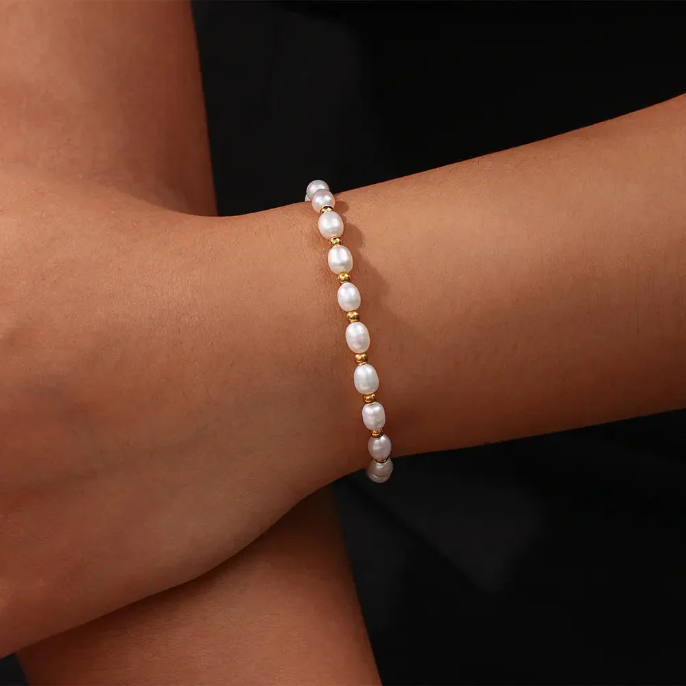 Elegante Parel e Bracciale in Oro