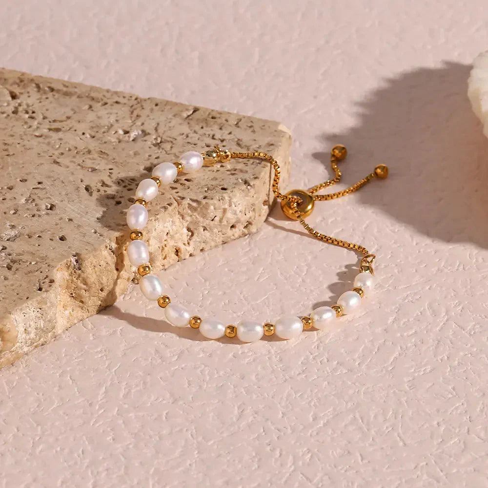 Elegante Parel e Bracciale in Oro