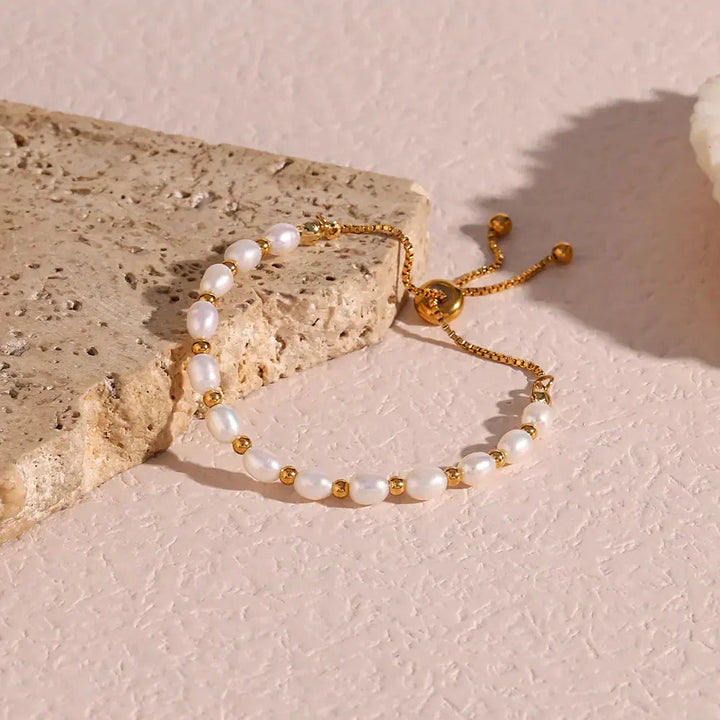 Elegante Parel e Bracciale in Oro
