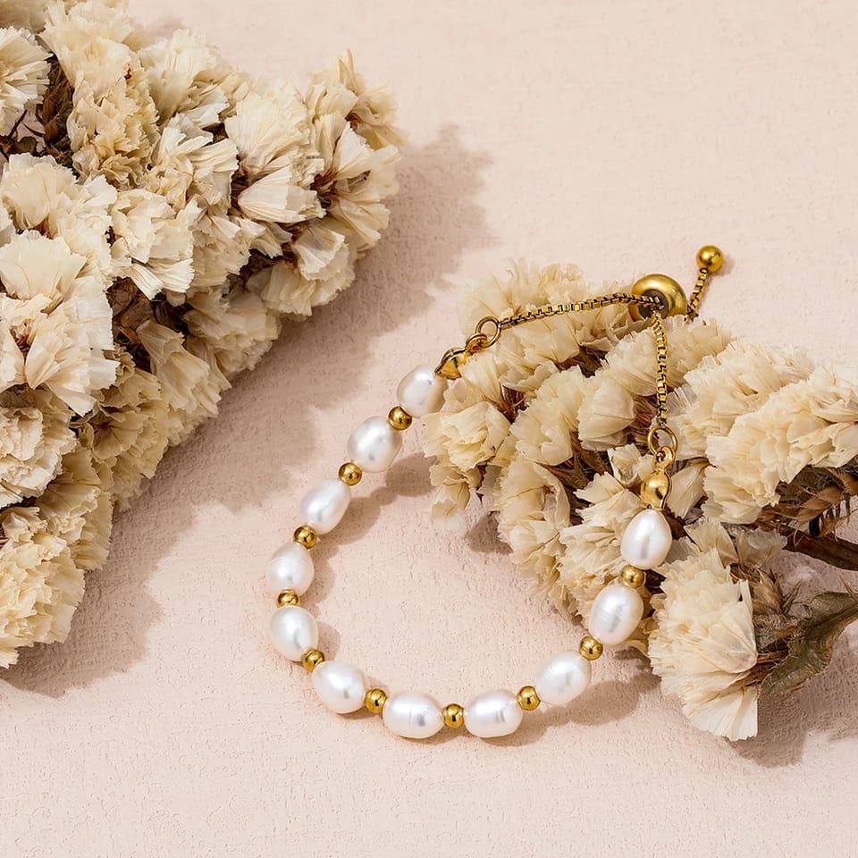 Elegante Parel e Bracciale in Oro