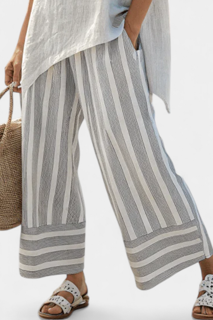 Talvora | Elegante Blusa Asimmetrica e Pantaloni a Righe