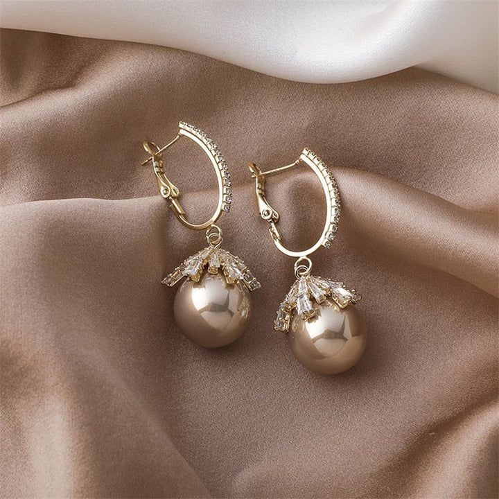 Orecchini Baby con Perle Magnifiche