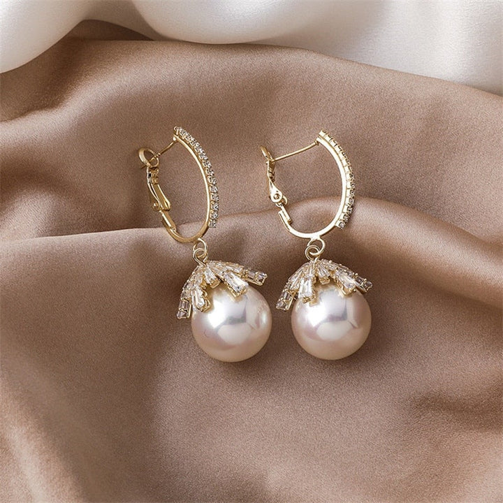 Orecchini Baby con Perle Magnifiche