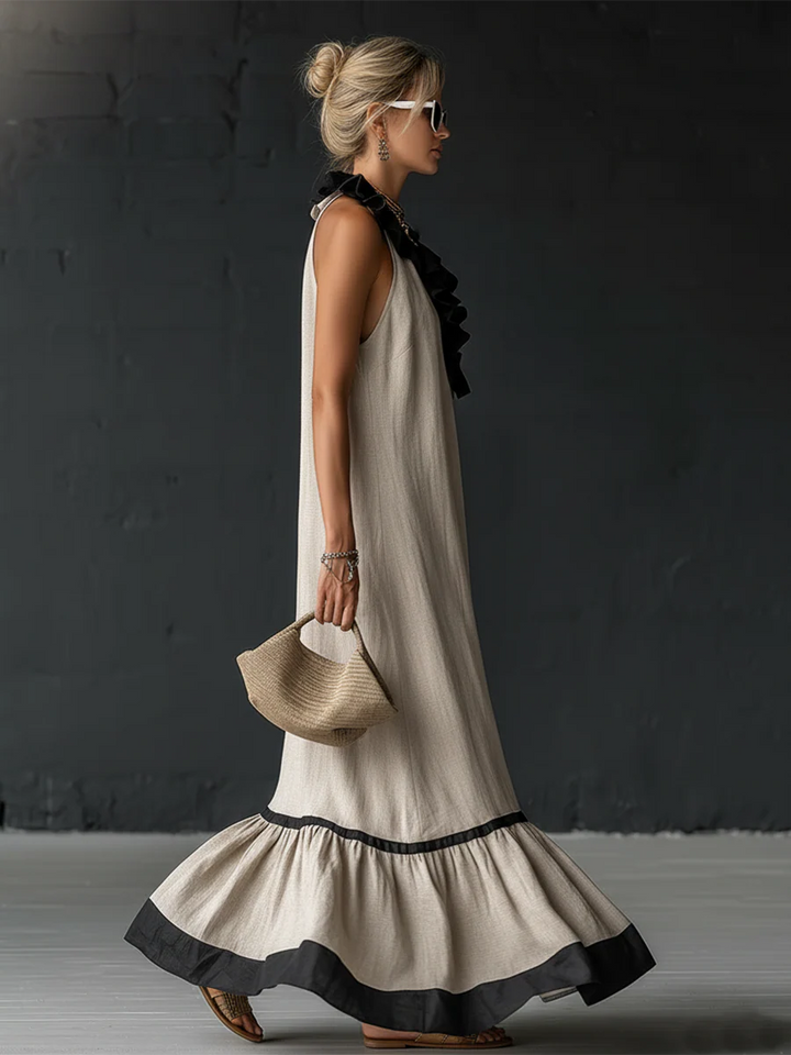 Vestito maxi elegante e romantico con volant e blocchi di colore